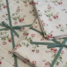 Charlotte Rose 132 x 229cm Cream Round Tablecloth, placemats and Napkin Gift Set